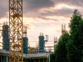 Construction site at sunset. Building under construction under crimson sky Royalty Free Stock Photo