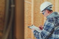 Construction Site Supervisor Engineer Making Proper Documentation on a Site Royalty Free Stock Photo