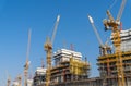 Construction Site with Tall Tower Cranes