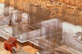 The construction site, top view. The finished foundation of a multistorey residential building under construction