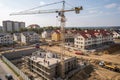 Construction site with tower crane and building progress Royalty Free Stock Photo