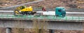 Construction site transport speeding on an highway panorama Royalty Free Stock Photo