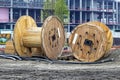 Construction site with two big empty cable drum