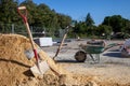 Construction site with wheelbarrows ready for work. Royalty Free Stock Photo