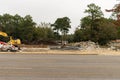 Construction site where a building was torn down using an excavator Royalty Free Stock Photo