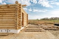 Construction site of wooden mountain house. Traditional log cabin built from wood logs Royalty Free Stock Photo