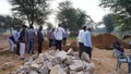 Construction site on work. People inspecting and working on the site for making a building