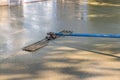 In construction site, workers are leveling concrete for driveway with a readymix concrete trowel in slump concrete Royalty Free Stock Photo