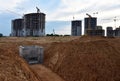 Construction of stormwater pits, sanitary sewer system distribution chamber and pump station. Sewerage manhole and pipes. Tower Royalty Free Stock Photo