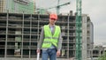 Pleased foreman posing for camera after building site inspection Royalty Free Stock Photo