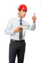 Construction supervisor with digital tablet showing a project Royalty Free Stock Photo