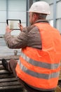 Construction supervisor with digital tablet on site Royalty Free Stock Photo