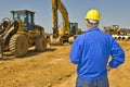 Construction Supervisor Overlooking Job Site Royalty Free Stock Photo