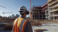 Construction supervisor overseeing a real estate project in an urban environment Royalty Free Stock Photo