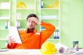 The construction supervisor planning new project in office Royalty Free Stock Photo