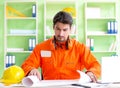 Construction supervisor planning new project in office Royalty Free Stock Photo