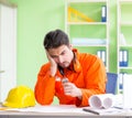 Construction supervisor planning new project in office Royalty Free Stock Photo