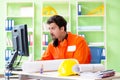 The construction supervisor planning new project in office Royalty Free Stock Photo