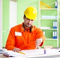 Construction supervisor planning new project in office Royalty Free Stock Photo