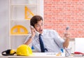 Construction supervisor working on blueprints Royalty Free Stock Photo