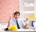 Construction supervisor working on blueprints Royalty Free Stock Photo