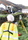 Construction survey digital analogue laser dot equipment on tripod surveying building roads. Royalty Free Stock Photo