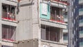 Construction suspended cradle hanging at the wall of a house under construction timelapse