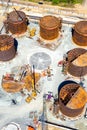 Construction of tank for an oil storage by sheet assembly. View from above. Flight around construction site