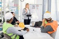 Construction team having discussion during meeting