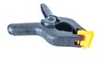 Construction tool black plastic clothespin on a white background Royalty Free Stock Photo