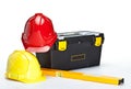 Construction toolbox, level and hardhats Royalty Free Stock Photo