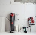 Construction tools as tiles cutter electric hammer drill Royalty Free Stock Photo