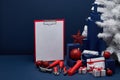 Construction tools, blank clipboard and Christmas decorations. Christmas and New Year construction Royalty Free Stock Photo