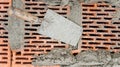 Construction tools close-up, trowel and putty knife with bricks and mortar and cement