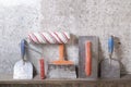 Construction tools on concrete background. Copy space for text. Set of assorted plaster trowel and spatula Royalty Free Stock Photo