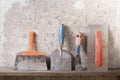 Construction tools on concrete background. Copy space for text. Set of assorted plaster trowel and spatula Royalty Free Stock Photo