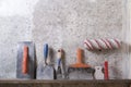 Construction tools on concrete background. Copy space for text. Set of assorted plaster trowel and spatula Royalty Free Stock Photo