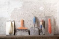 Construction tools on concrete background. Copy space for text. Set of assorted plaster trowel and spatula Royalty Free Stock Photo