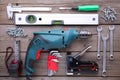 Construction tools on a grey wooden desk