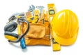 Construction tools isolated on white helmet toolbelt earphones and other Royalty Free Stock Photo