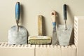 Construction tools in a row and bricks.Building and renovation concept. Royalty Free Stock Photo