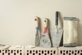 Construction tools in a row and bricks.Building and renovation concept. Royalty Free Stock Photo