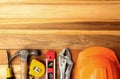 Construction tools on wood table background. Top view with copy space Royalty Free Stock Photo