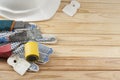 Construction tools on wooden background. Copy space for text. Set of assorted plastering , gloves and spatula . Top view Royalty Free Stock Photo