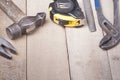 Construction tools on wooden background. Copy space for text. Set of assorted work tool at wood table . Top view Royalty Free Stock Photo