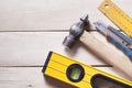 Construction tools on wooden background. Copy space for text. Set of assorted work tools. Top view Royalty Free Stock Photo