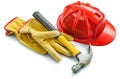 Construction tools yellow leather gloves red helmet and hammer iswolated on white Royalty Free Stock Photo