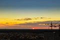 Construction tower crane,Industrial construction cranes on amazing sunset sky background Royalty Free Stock Photo