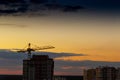 Construction tower crane,Industrial construction cranes on amazing sunset sky background Royalty Free Stock Photo