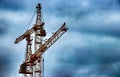 Construction. Tower crane. The process of building residential buildings. Royalty Free Stock Photo
